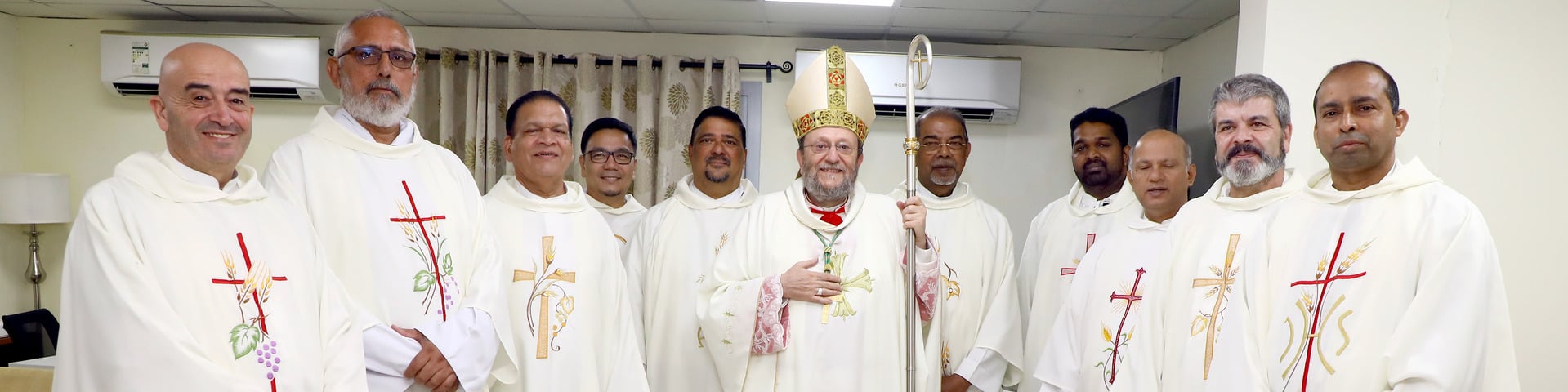 Bishop Paolo with priests of the Vicariate in Mass vestments